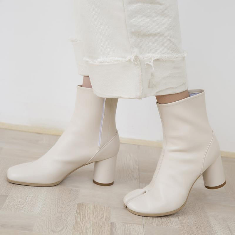 Annukka Tabi Boots - Elevate your style with FORTH's Annukka Tabi Boots. Explore avant-garde design and superior comfort in these fashion-forward statement boots for a standout look this season